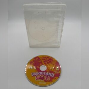 Nintendo Wario Land: Shake It! Video Game - Red and Yellow